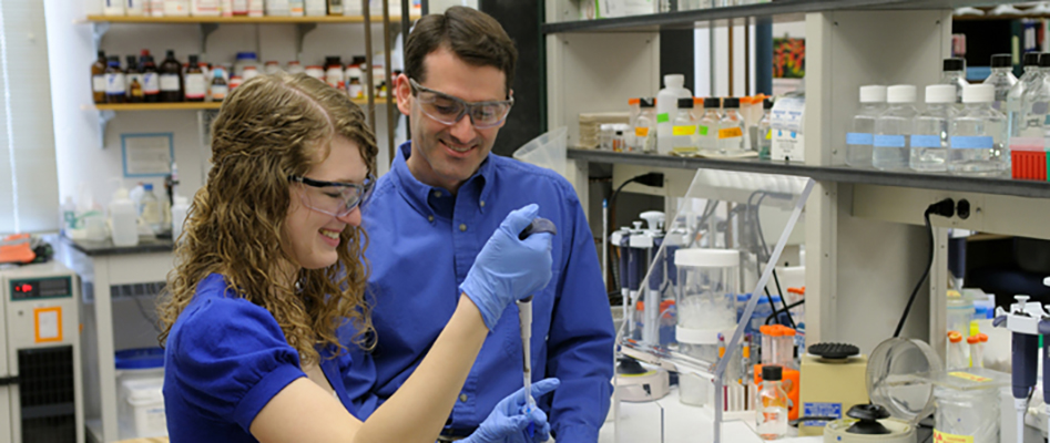 Professor and student in laboratory