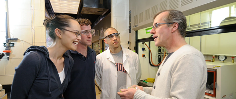 Professor talking with students