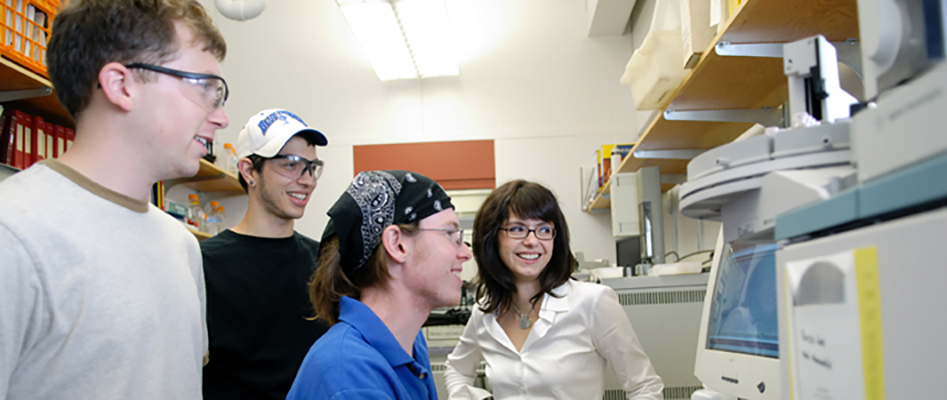 Professor talking with students