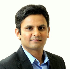 Head shot of Prashant Jain in a white background