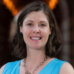 Head shot of Christy Landes on a dark background